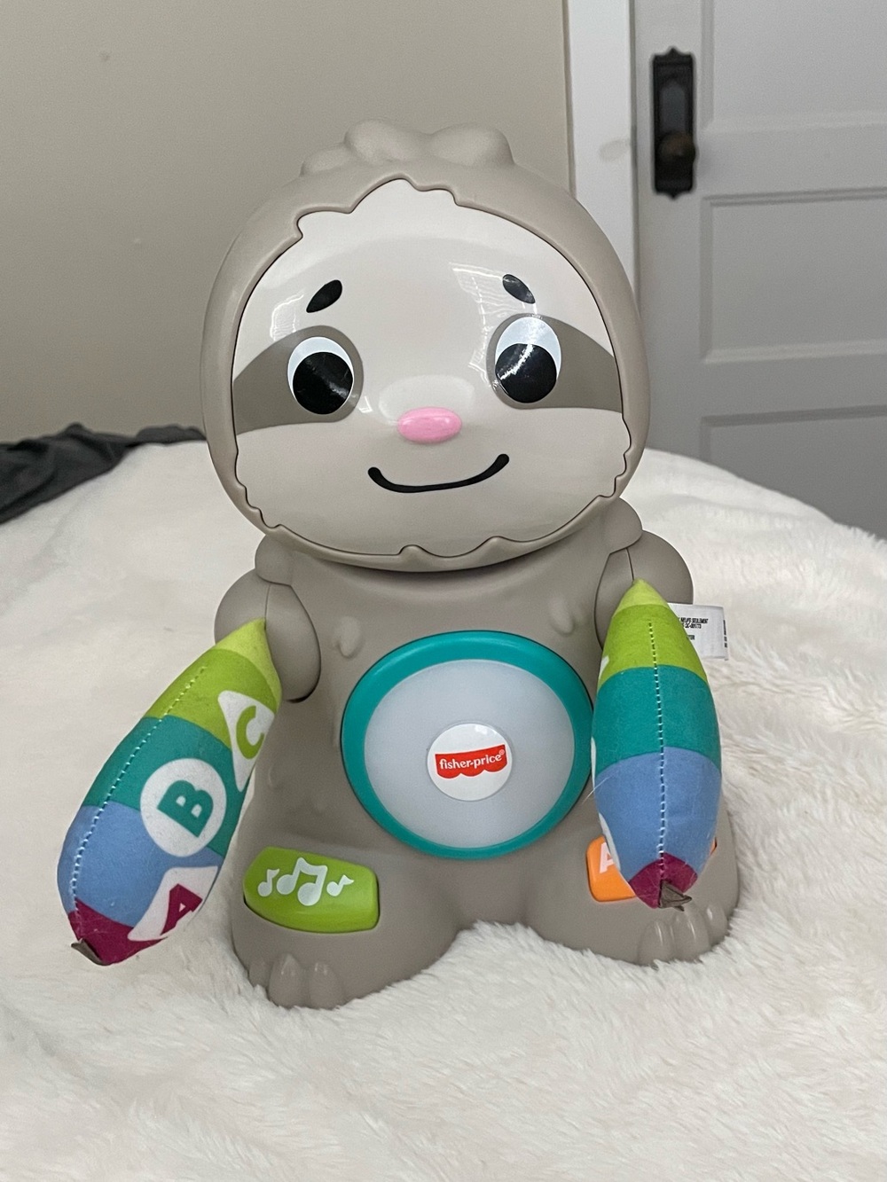 Fisher-Price Taupe Sloth Musical Learning Toy with Teal and Multi-Color Accents